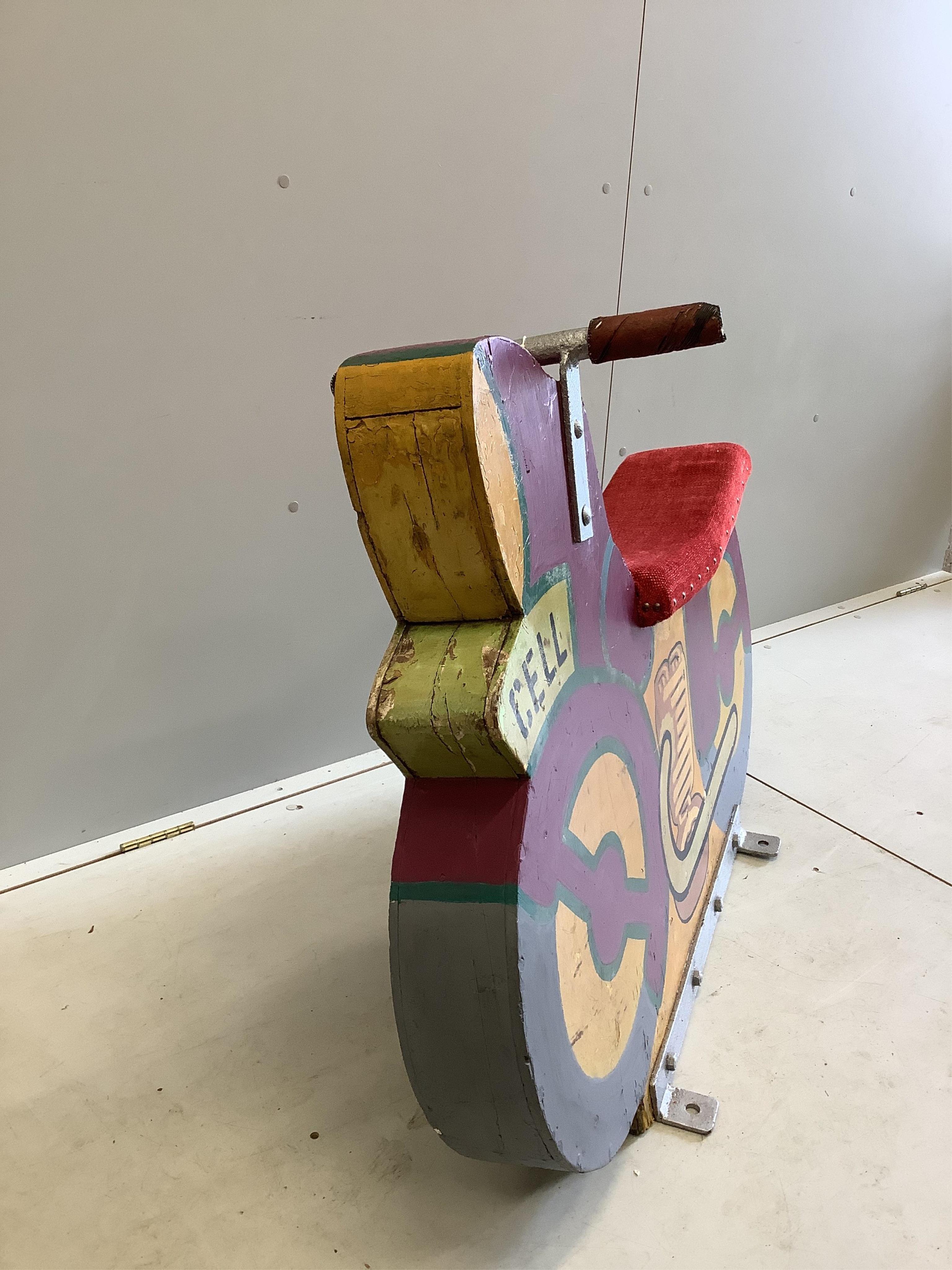 A mid 20th century carved painted wood fairground 